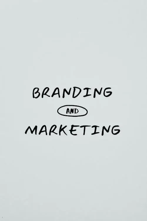 White paper with a marketing slogan for Brand Building for SMEs.