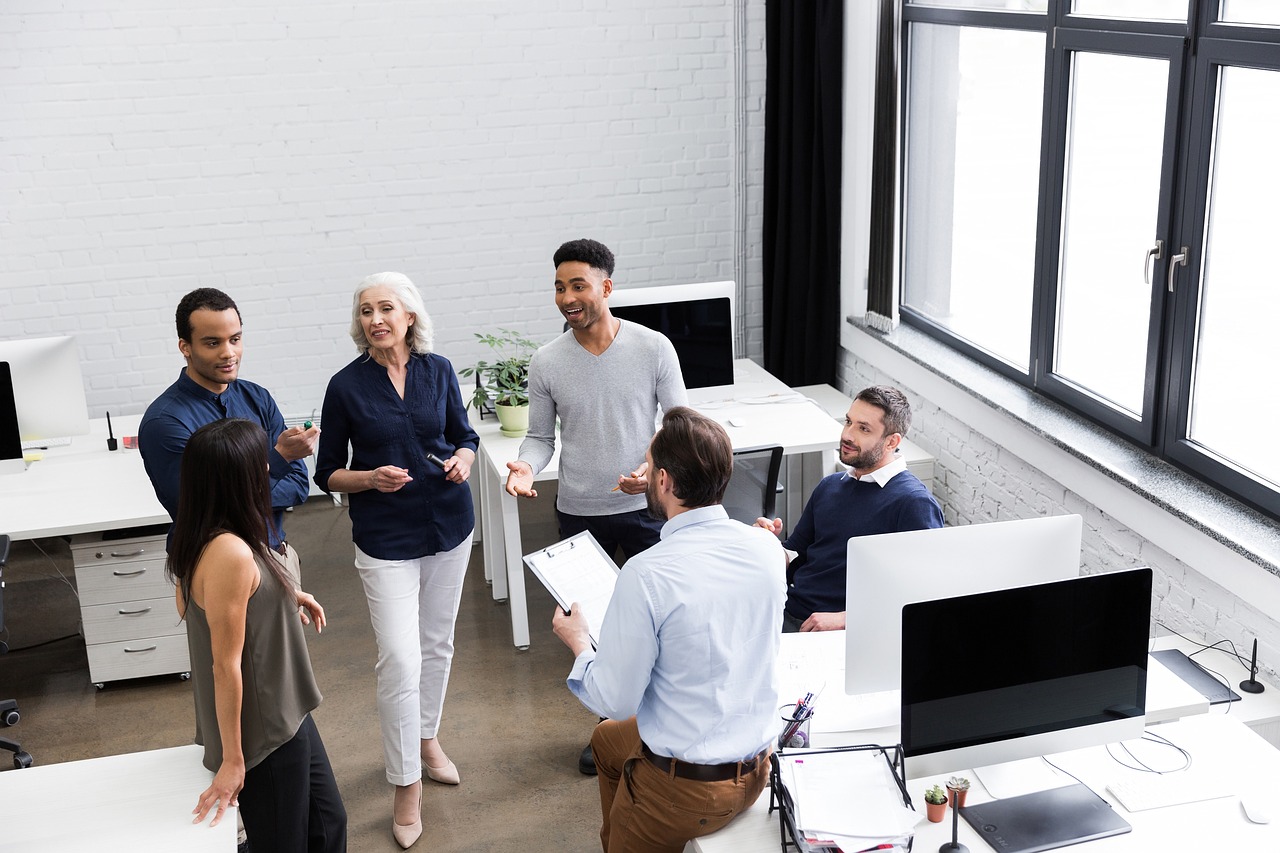 Corporate colleagues discussing a corporate event
